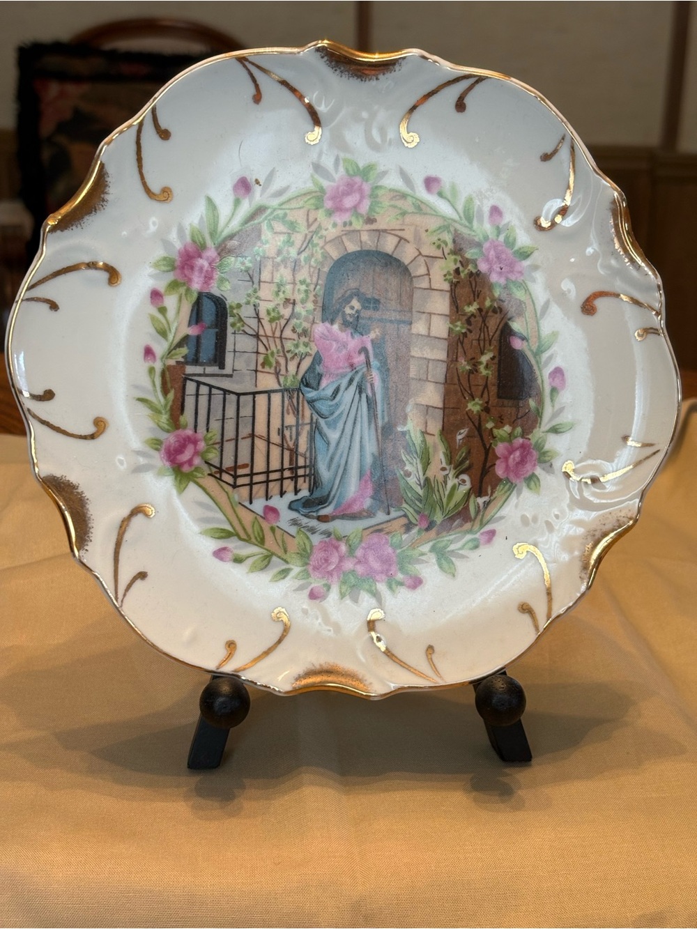 Decorative Porcelain Wall Plate with Pink Floral Wreath and Gold Accent